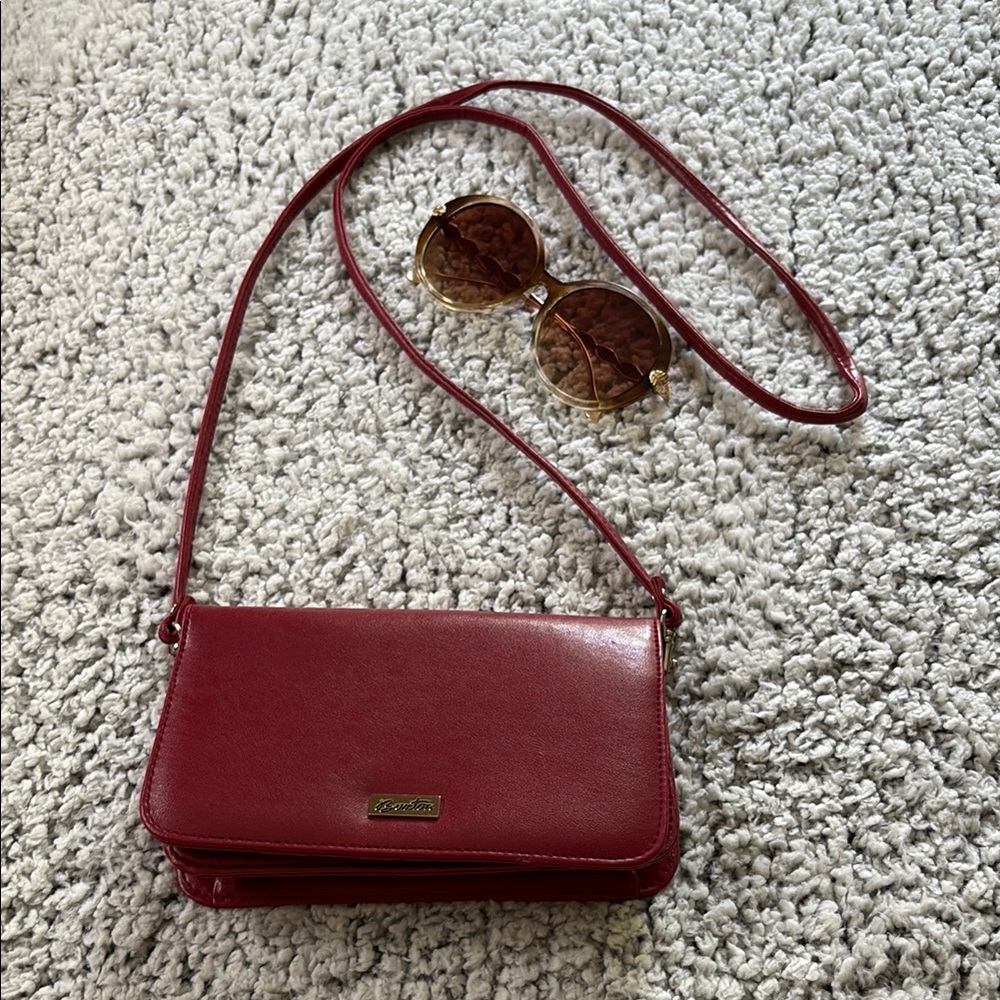 Buxton crossbody bag. Red. PVC.